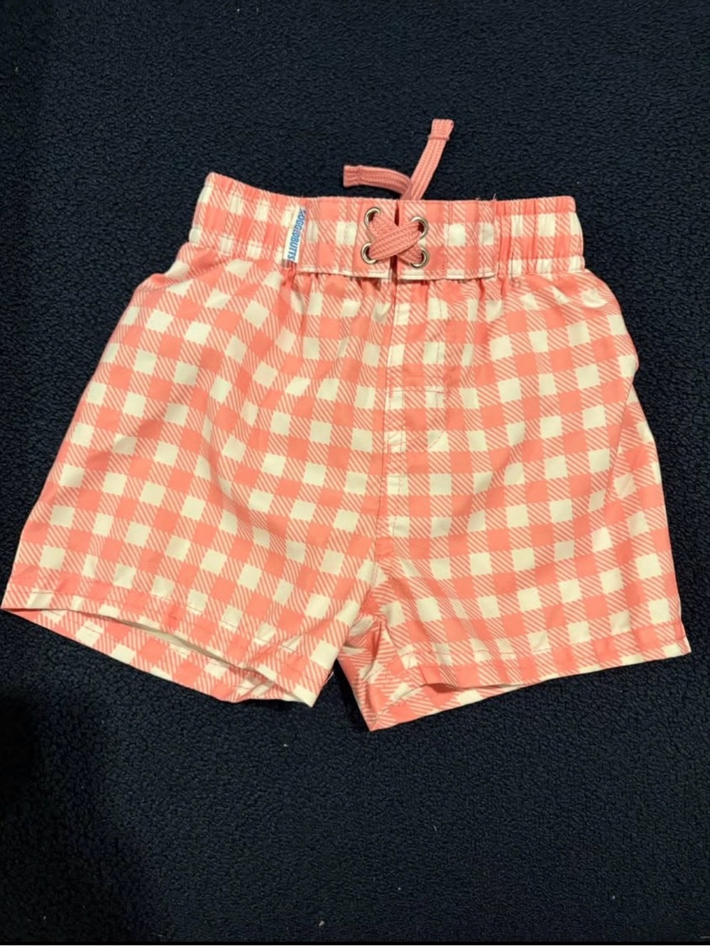 Ruffle Butts Coral and Cream Gingham Swim Trunks